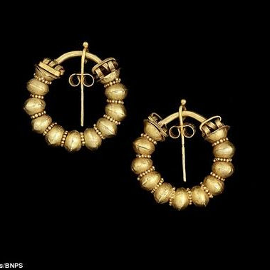 Elizabeth Jane Howard's ancient 2,400 year old gold hoop earrings.