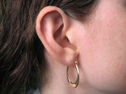 14k Yellow Gold Tapered Oval Hoop Earrings, 1 Inch (1.5mm Tube) - LooptyHoops