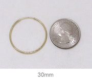 14k Yellow Gold Endless Hoop Earrings (1.25mm), All Sizes - LooptyHoops